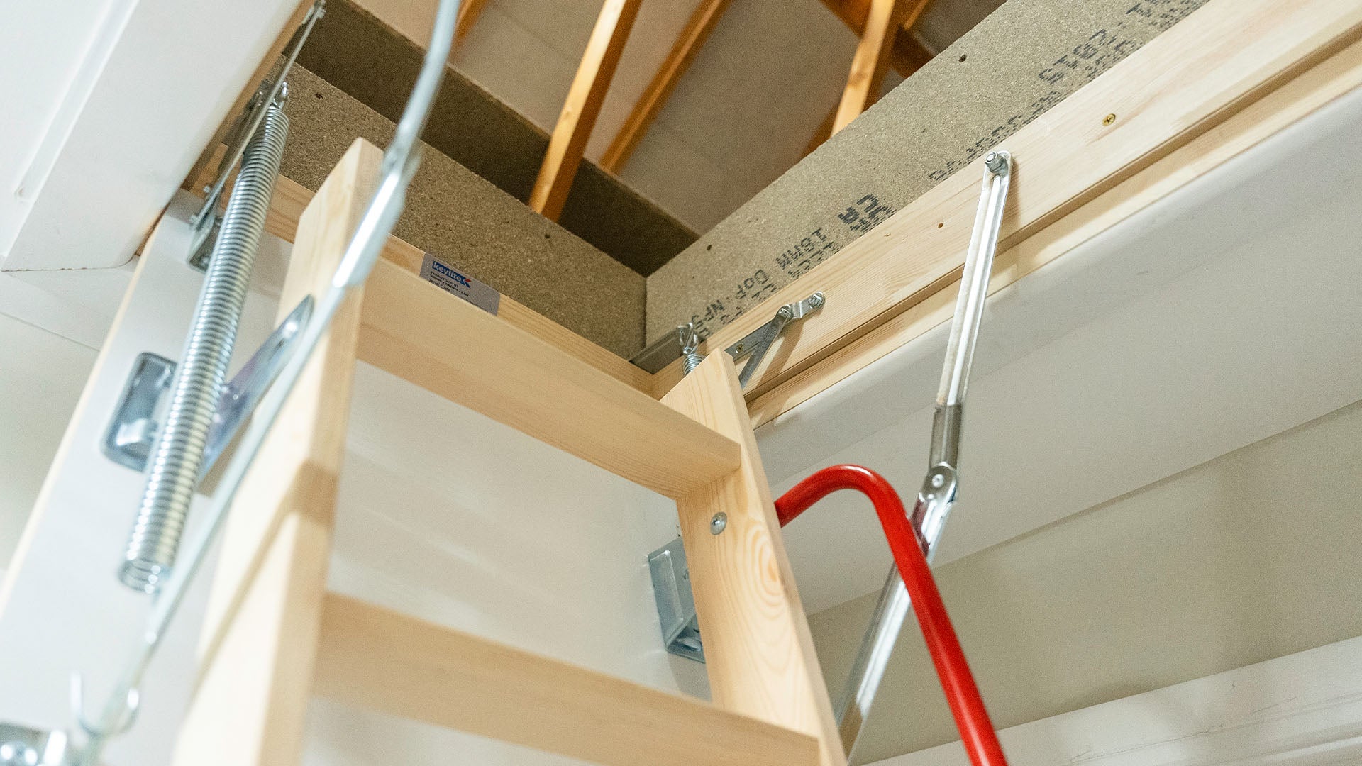 Closeup of loft ladder in the loft hatch — Loft-Trac