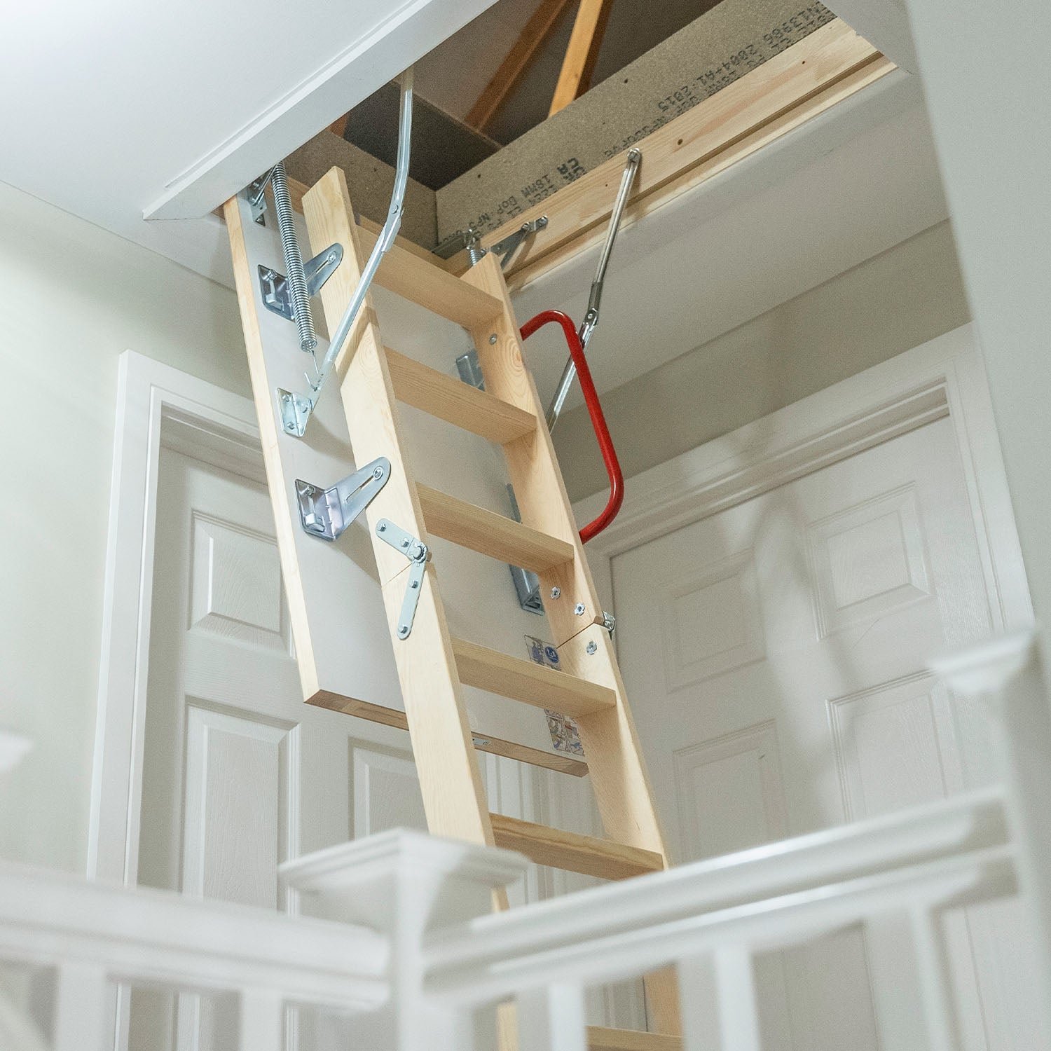 Loft ladder going up to loft — Loft-Trac